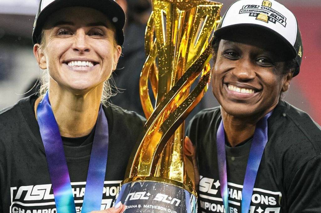 Nikki Stanton, left, and Jasyme Spencer pose for a photo with the Diana B. Matheson Cup at BMO Field in Toronto, Saturday (Nov. 15). (Northern Super League/ Facebook)
